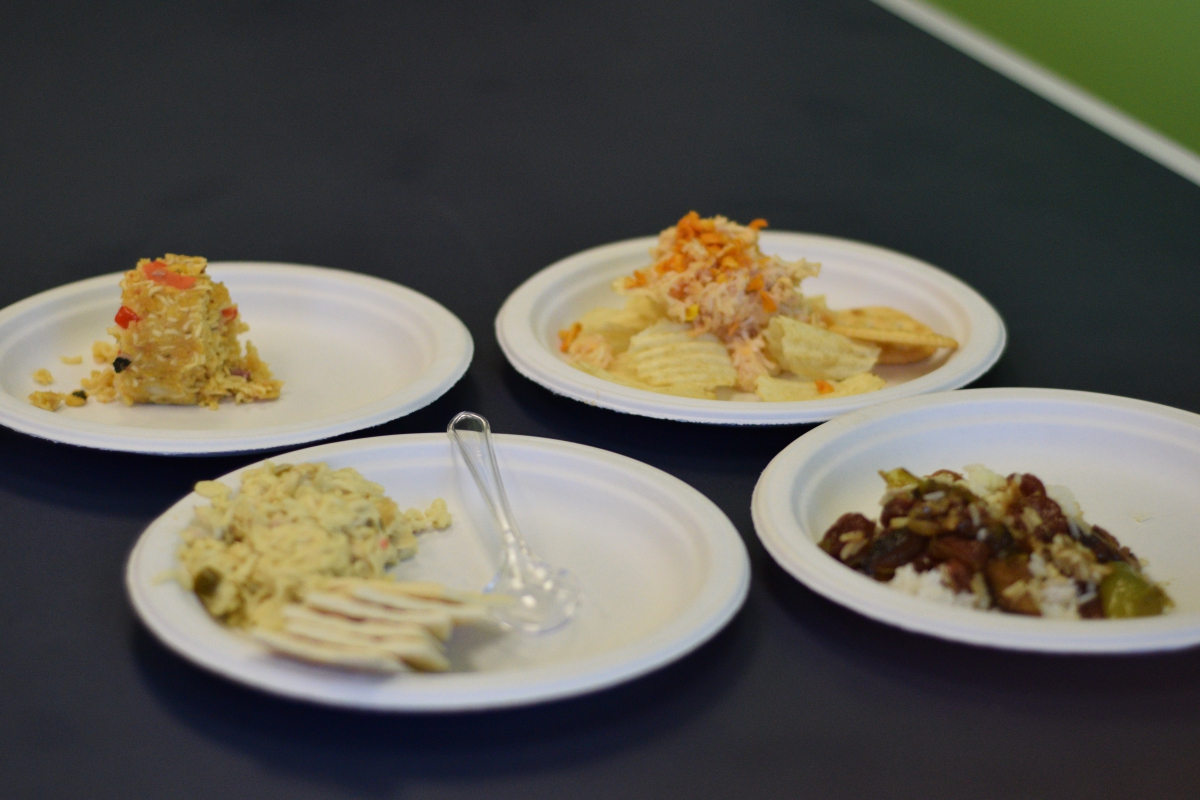 Clockwise from top left: Zheng's Fritos-ramen-casserole, Agakian's jalapeno-ramen-tuna on chips, Thao's Chinese sausage fried rice, Seuga's tuna-ramen on saltines. Photo by Kiwi Illafonte.