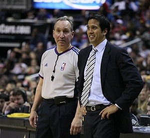 Miami Heat head coach Erik Spoelstra, right, presents a 2011-12