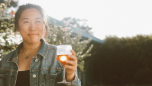 Photo of woman holding a wine glass
