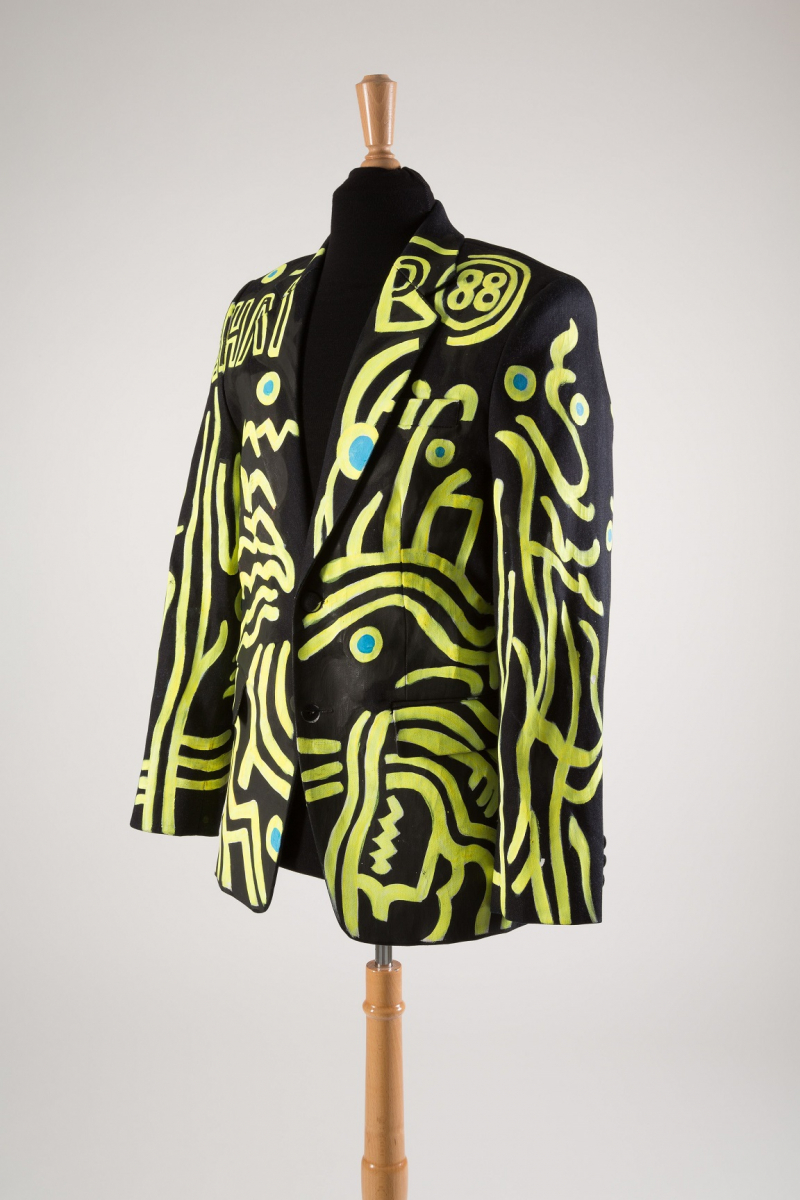 Shail Upadhya, jacket, cotton denim and paint, 1988. Yellow swirling lines painted against a dark men's jacket.